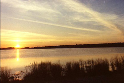 Photo of sunset at a lake.