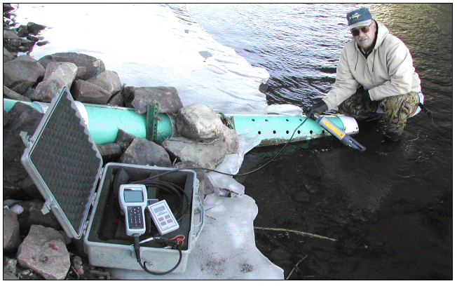 Large-Diameter Polyvinylchloride (PVC) Pipe Used To Protect River Probes