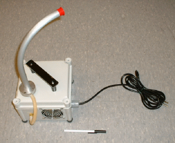 Figure 1. Indoor Particle Exposure Sampler—Outside and Inside Views