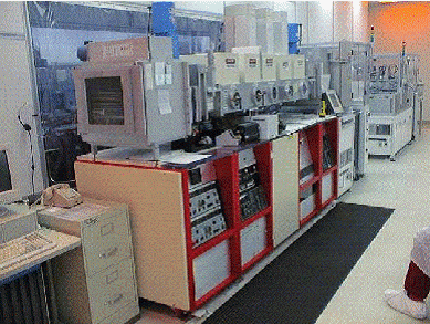 System at Intematix’s Facility. This system was configured for PVD on large area substrates up to 15-by-12 inches in size. The initial configuration of the system utilized linear sputtering (PVD) capability together with an existing CVD furnace, in which nanotubes were already growing.