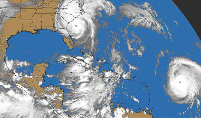 Satellite image showing two hurricanes off the east coast of the United States.
